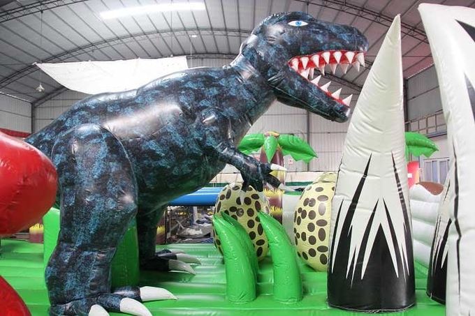 La ville gonflable orientée d'amusement de dinosaure, message publicitaire badine le pullover gonflable